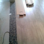 Pose de parquet et jointure avec le carrelage